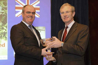 Lord Lieutenant Mr Peter Field presents the Queen’s Award to Mr Donnie Munro